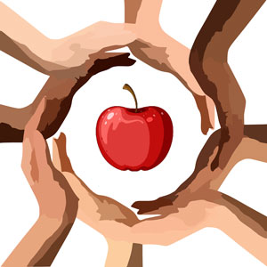 multiracial hands enveloping an apple.